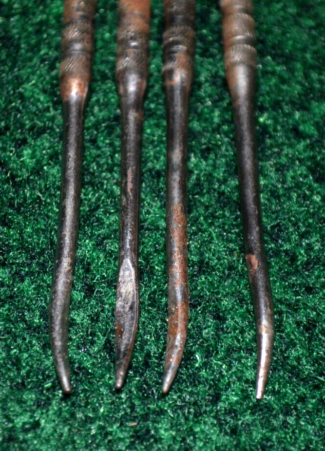 Four Vintage Nut Picks