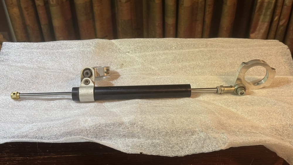 storz performance 5 1/2" travel 9 click adjustable steering damper