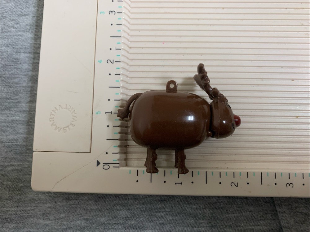 Vintage Plastic Pooper Reindeer Candy Dispenser