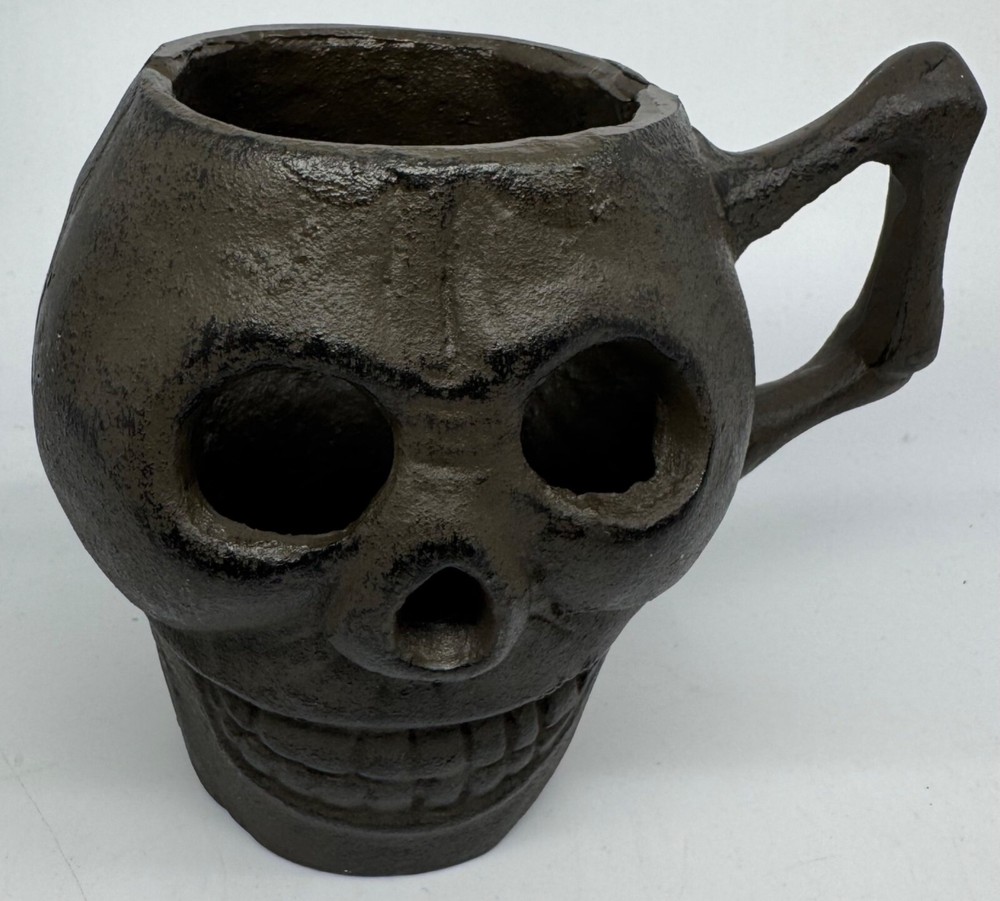 Cast Iron Skull-Shaped Bottomless Mug Thingy With Handle Both Ends And Eyes Open