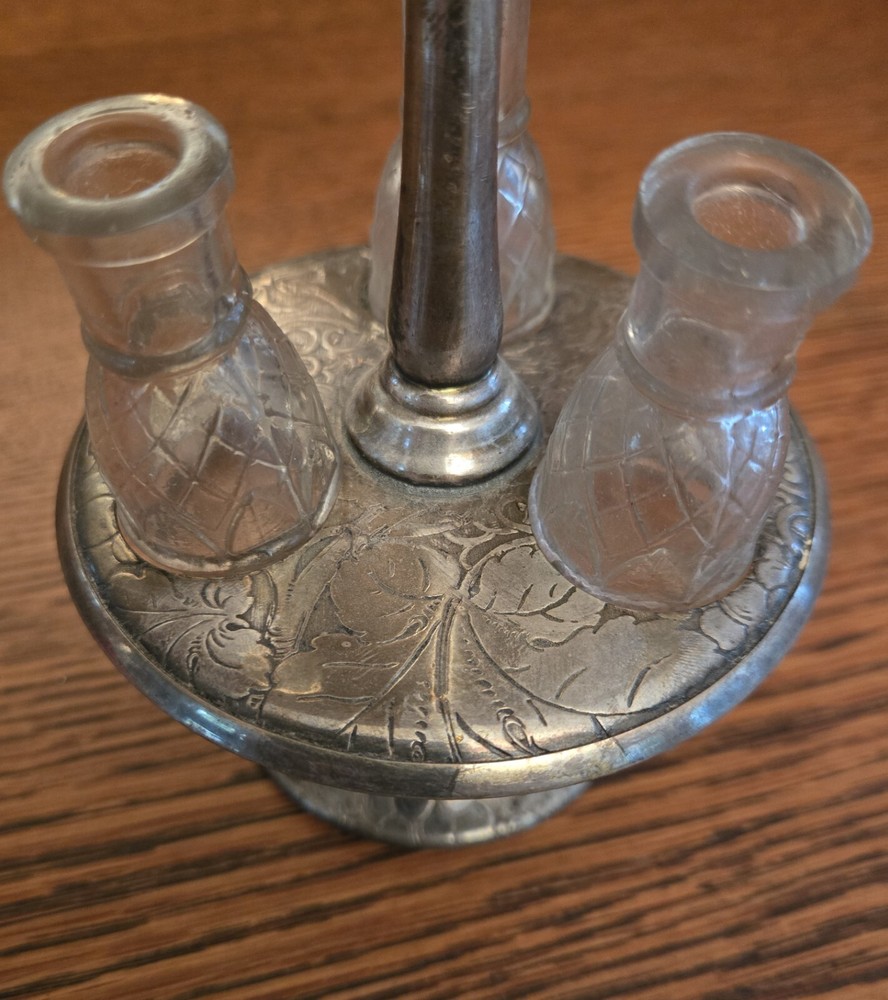 Vintage Castor Holder with 3 small bottles