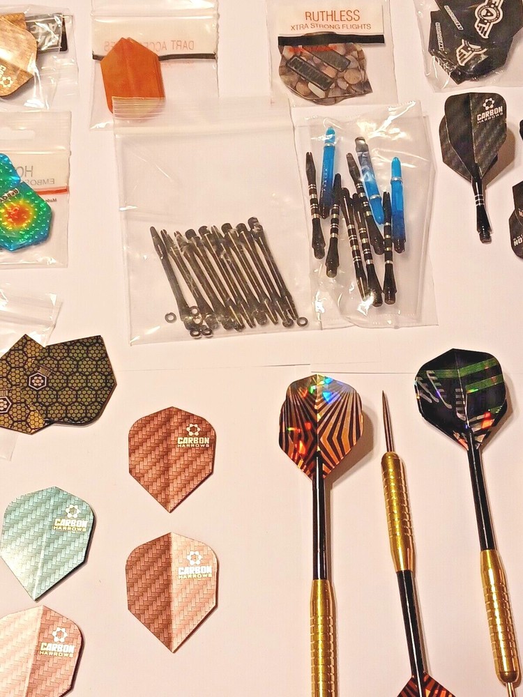 6 Darts And Accessories