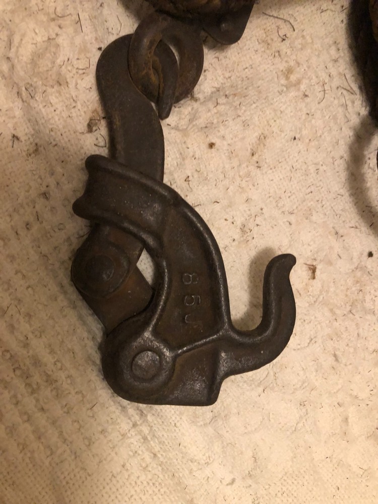 Antique primitive rope and chain hoist