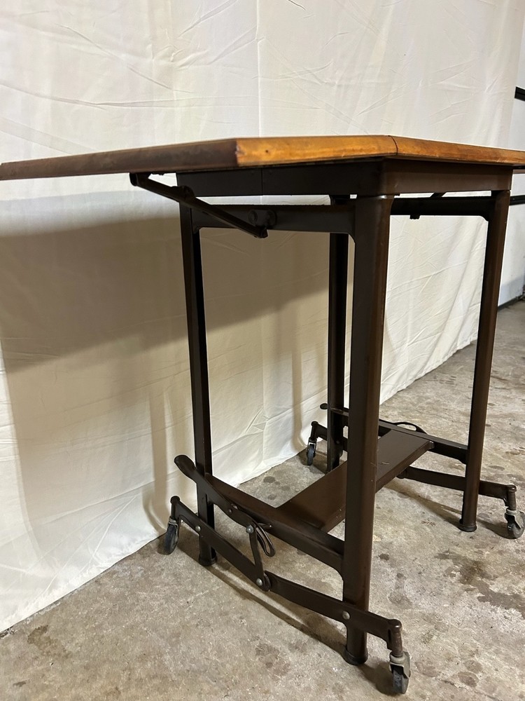 Unique rustic industrial steampunk drop leaf utility table, steel base