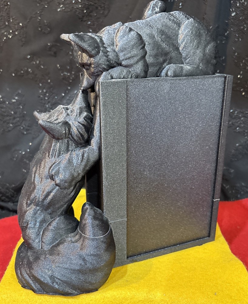 Light Weight Plastic Coyotes Playing On A Book W/Hiddon Door