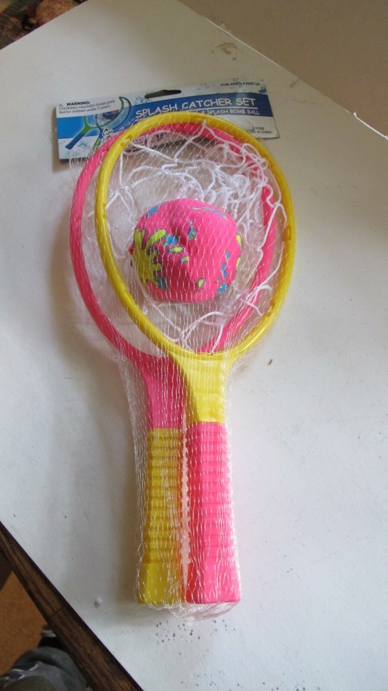 Splash Catcher Set. Two Rackets and a Splash Bomb Ball. New.