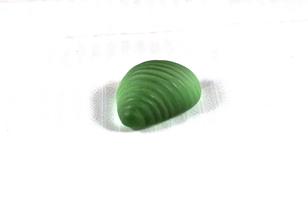 Unusual 1.5" Resin or Hard Plastic Stone?