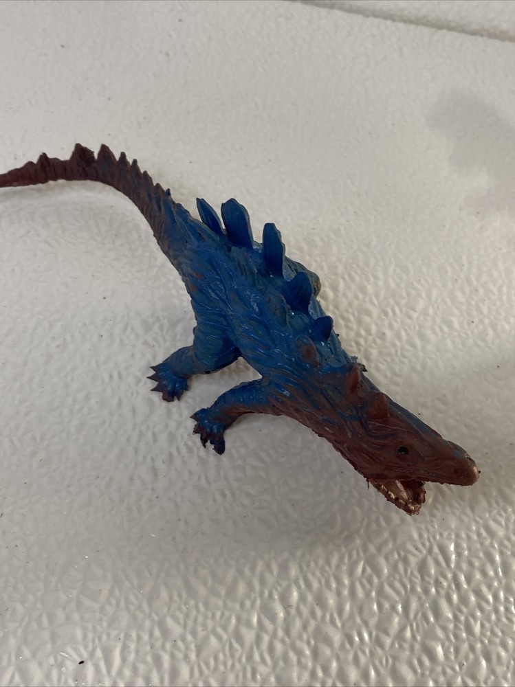2 Approx 6” Rubber Toy Dinosaurs