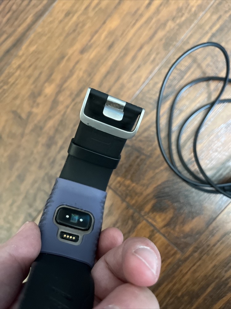 Fitbit Surge Wristband Activity Tracker Doesn’t Hold A Charge. With Charger