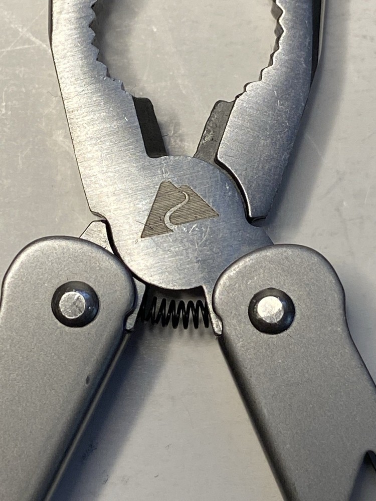 Ozark Trail 12-in-1 Multi Tool Folding Pliers with Sheath Silver