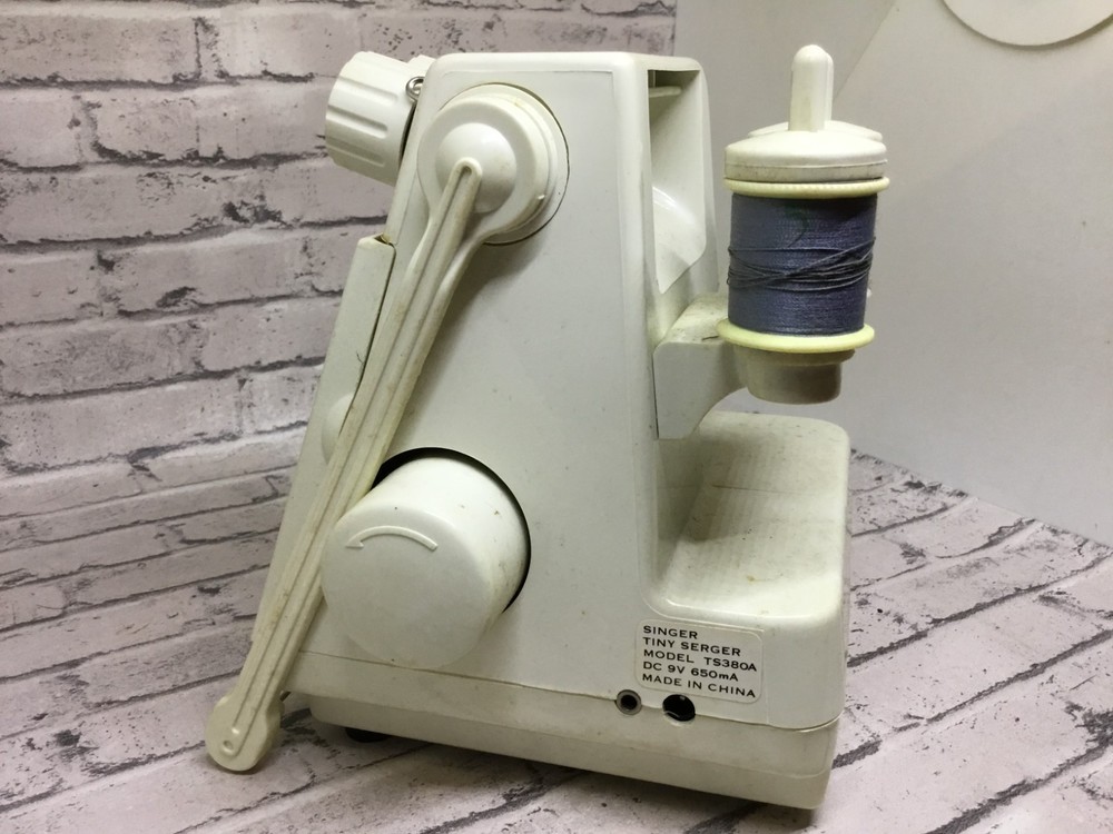 singer tiny serger ts380 plus parts only no cords untested