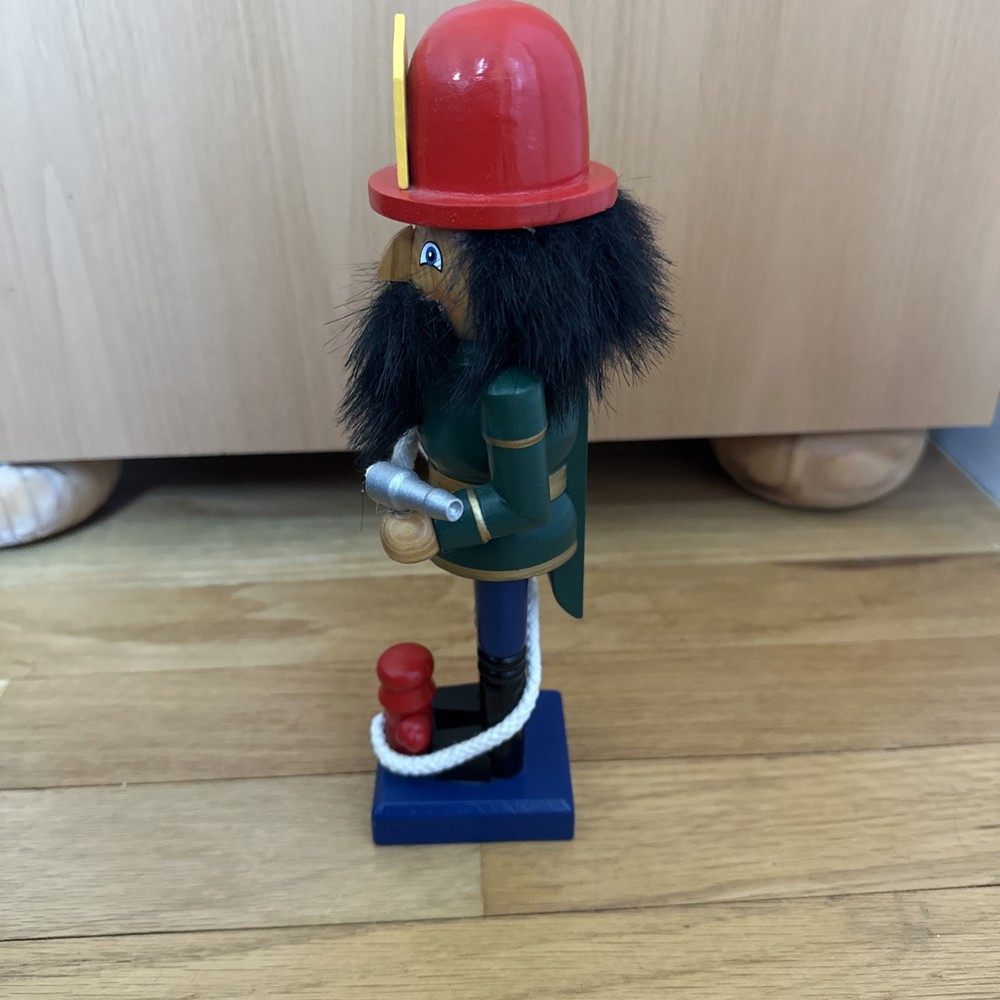 Fireman Nutcracker 10" Tall with Fire Hydrant and Fire Hose