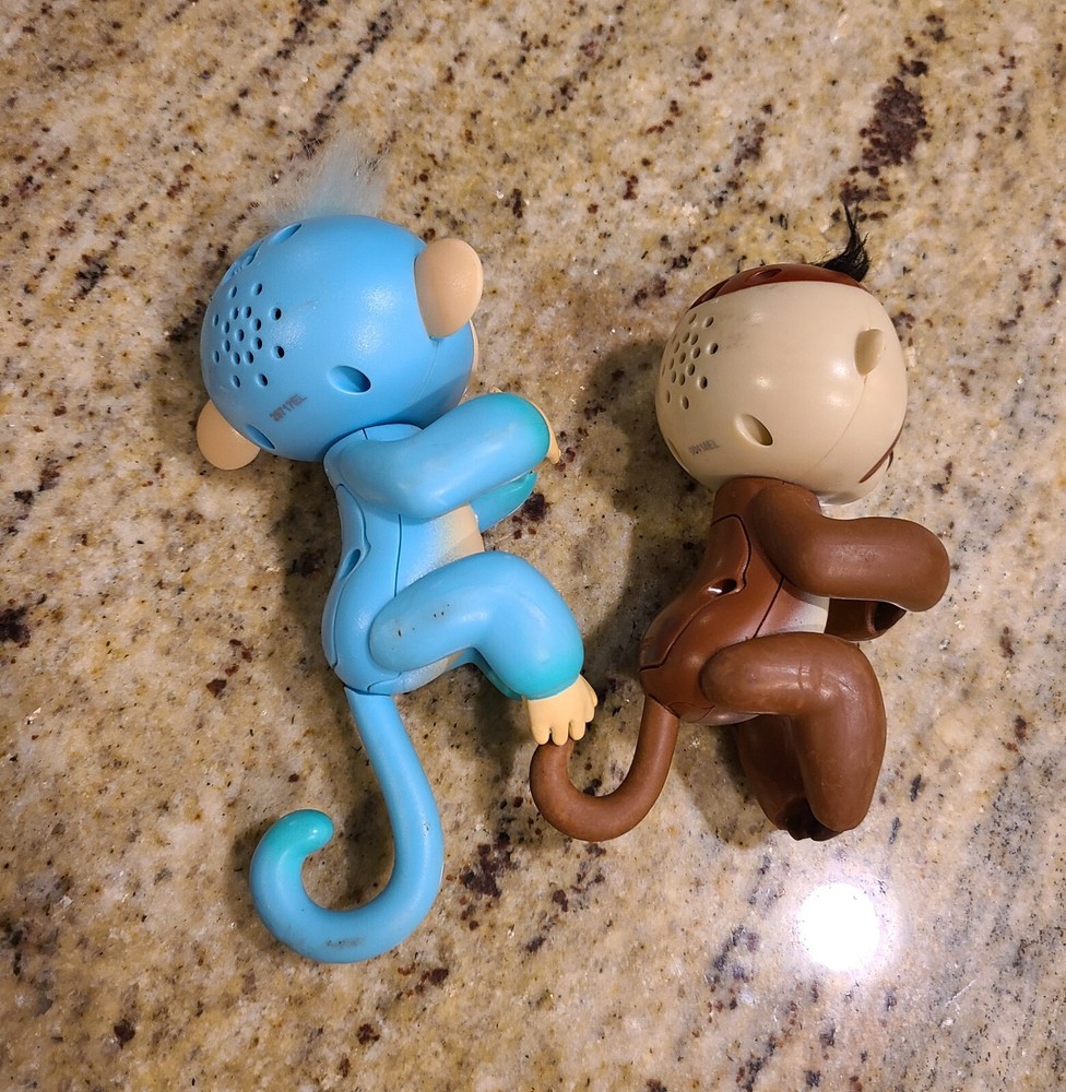 2 Fingerlings Interactive Baby Monkey Blue Brown Toys. Both work tested.