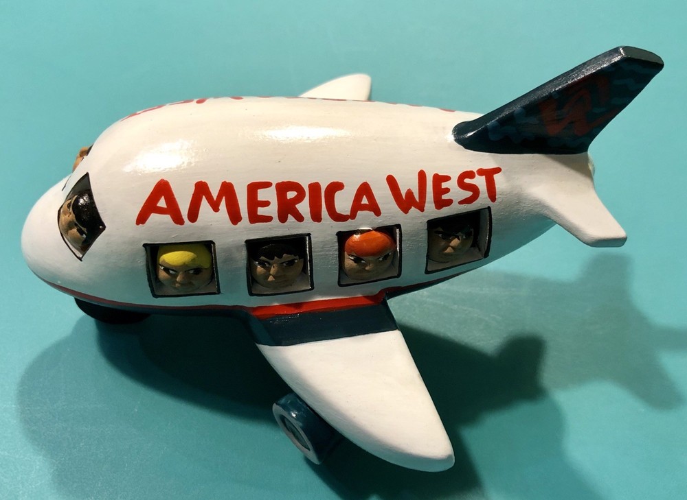 AMERICA WEST AIRLINES HAND PAINTED CERAMIC PLANE
