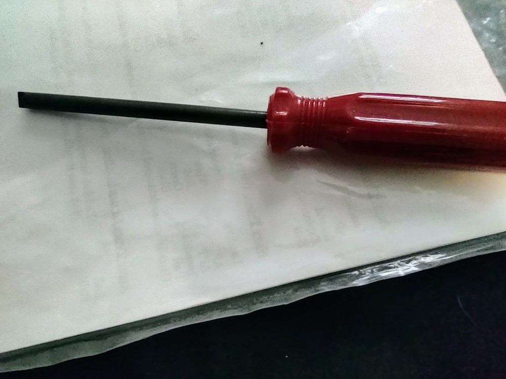 Three gun screwdrivers with hollow ground tip.