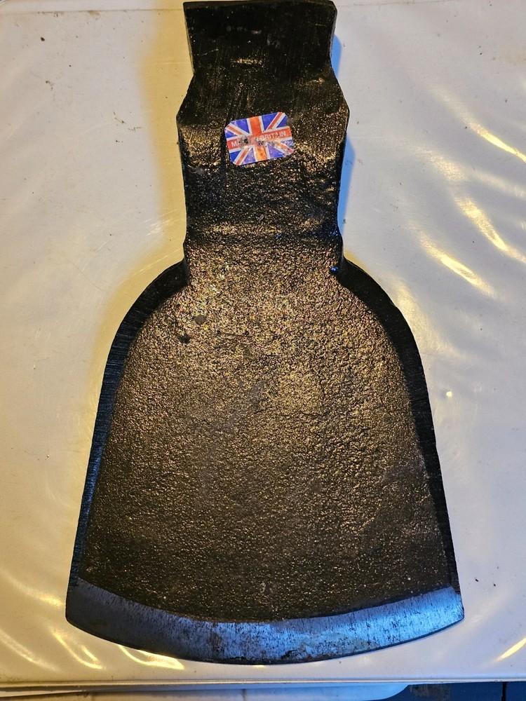 Axe Head has marked in Britain sticker on it