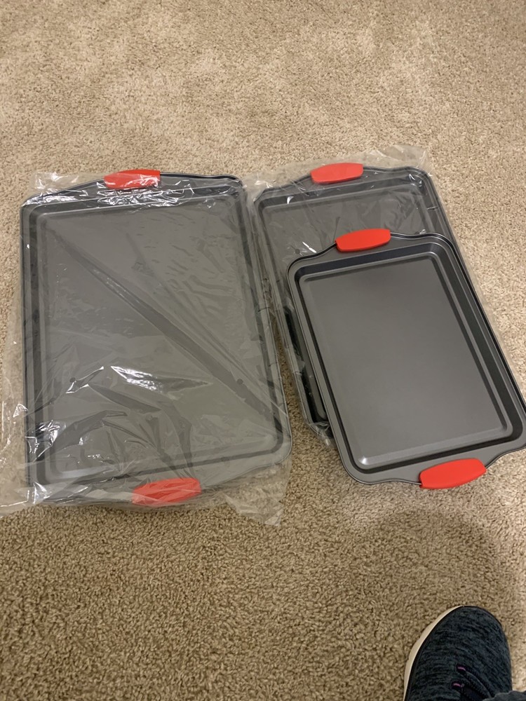 gray with red handles small, medium, large bake pans