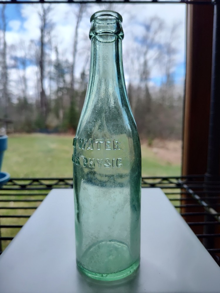 Vintage Pluto Water Bottle America’s Physic Devil Embossed Green