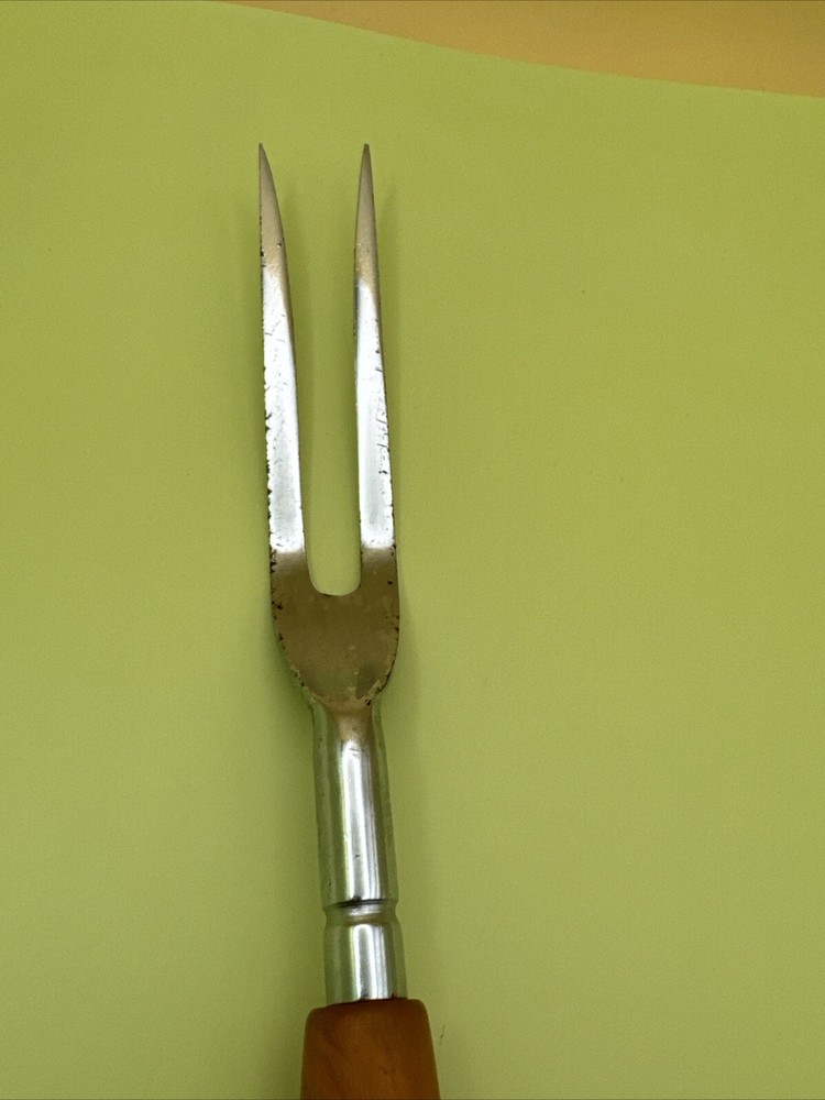 9.5” Vintage bakealite handled MCM meat Fork
