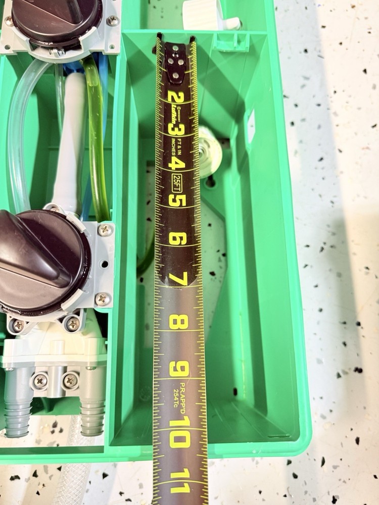 3M Flow Control System chemical dispenser, a wall-mounted.