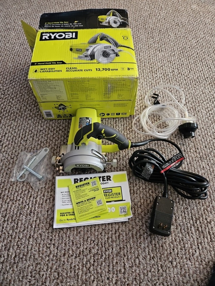 RYOBI TC401 "4" HAND HELD TILE SAW.