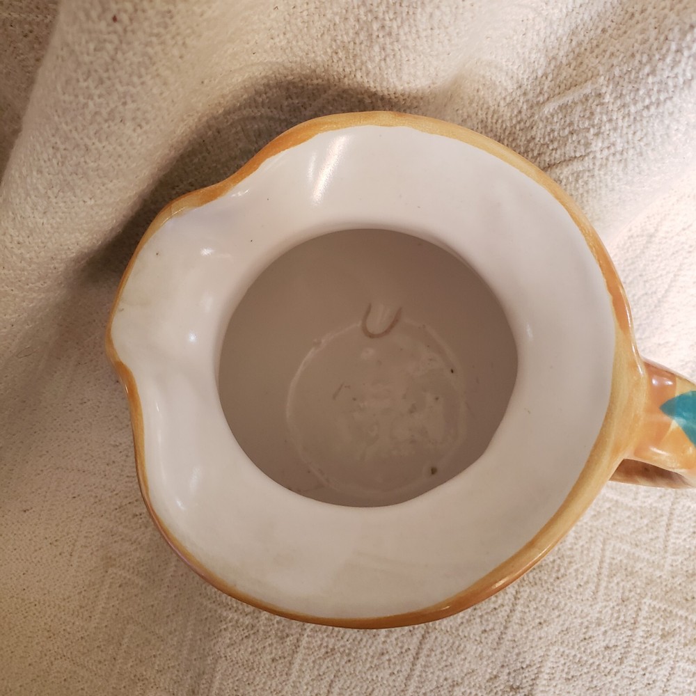 LASSER SIGNED ORANGE/BROWN & GREEN LEAF/PETAL PITCHER.