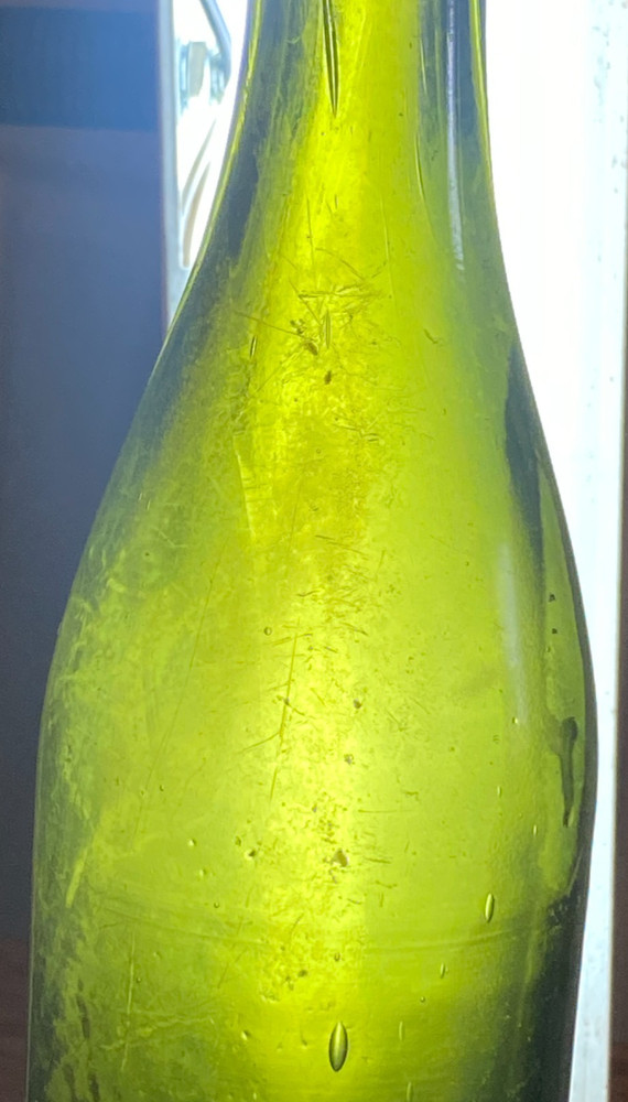 Antique Green bottle#1 BLOWN, SPUN MOLD, APPLIED TOP, PUNT BOTTOM