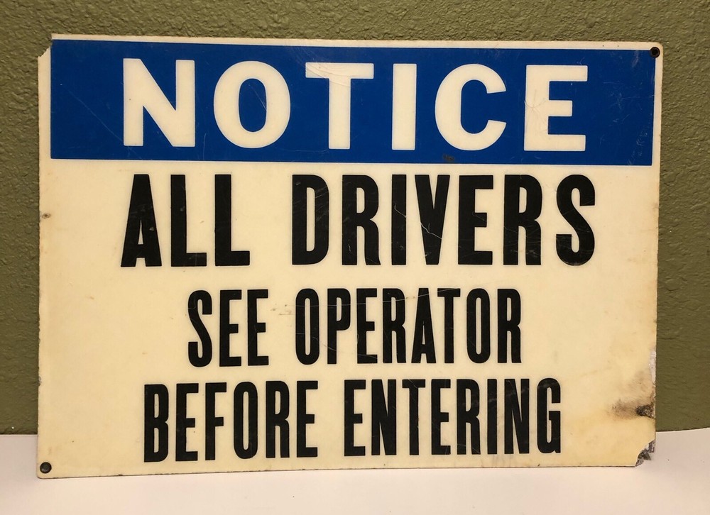 Vintage "NOTICE ALL DRIVERS SEE OPERATOR BEFORE ENTERING" LAMINATED SIGN