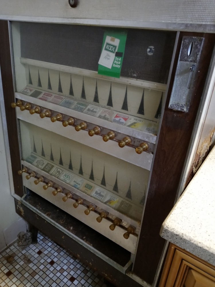 A Vintage 1963 Old Cigarette Machine
