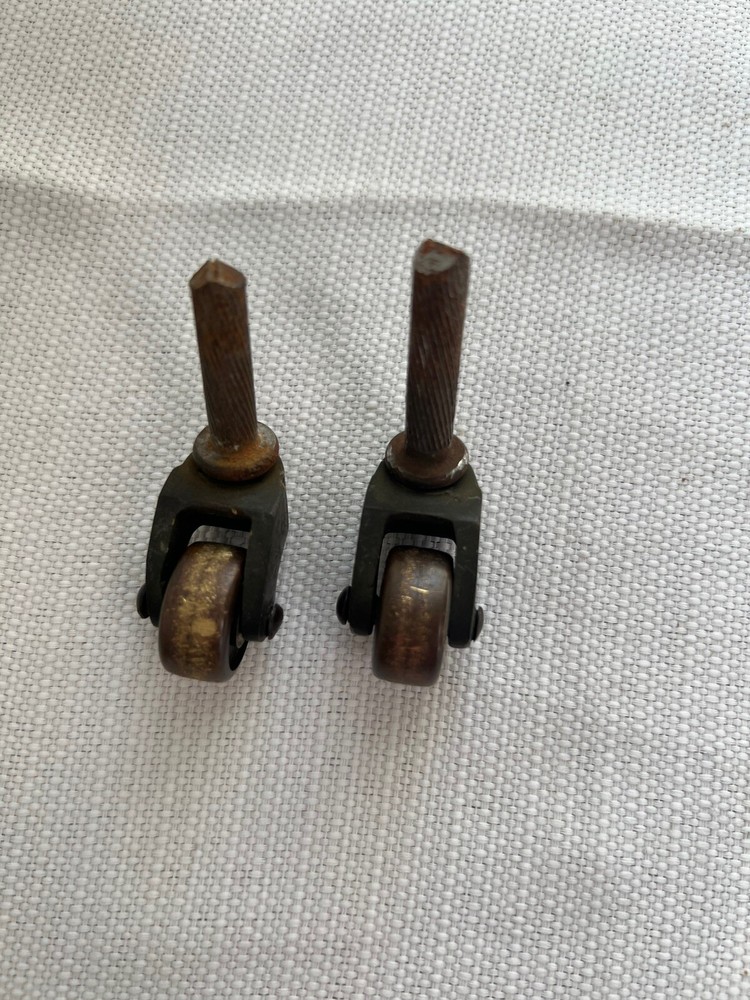 Two Antique Metal Casters