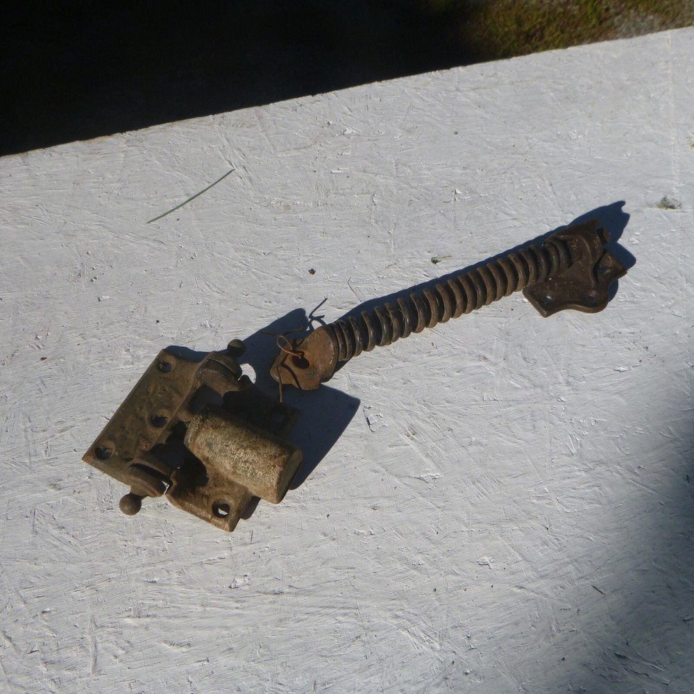 Antique spring loaded door closure