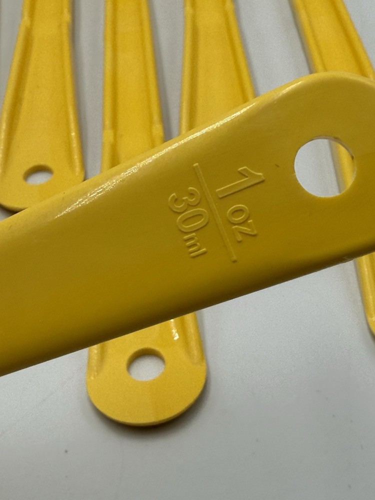 Carlisle 1 Oz. Yellow Long Handle Portion Spoon