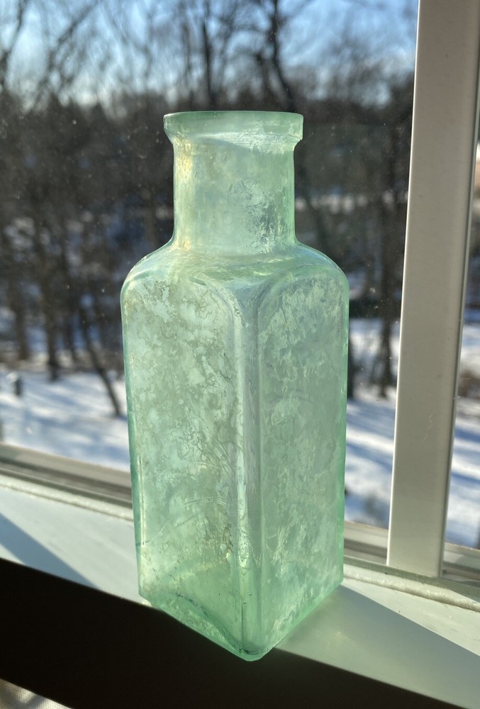 Frank Miller’s Crown Dressing New York NY Blown Bottle