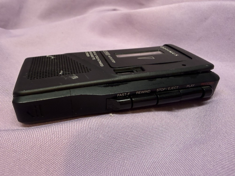 Optimus Micro-33 Voice Activated Microcassette Recorder. Not Tested.