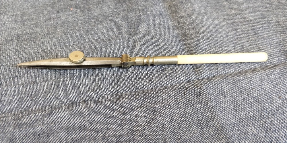 Vintage drafting Pen with white handle Bone?