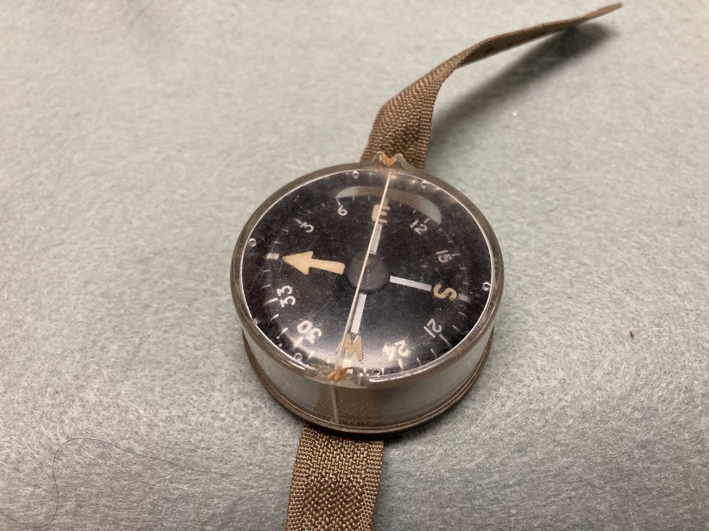 (a105) vintage Compass on wrist strap