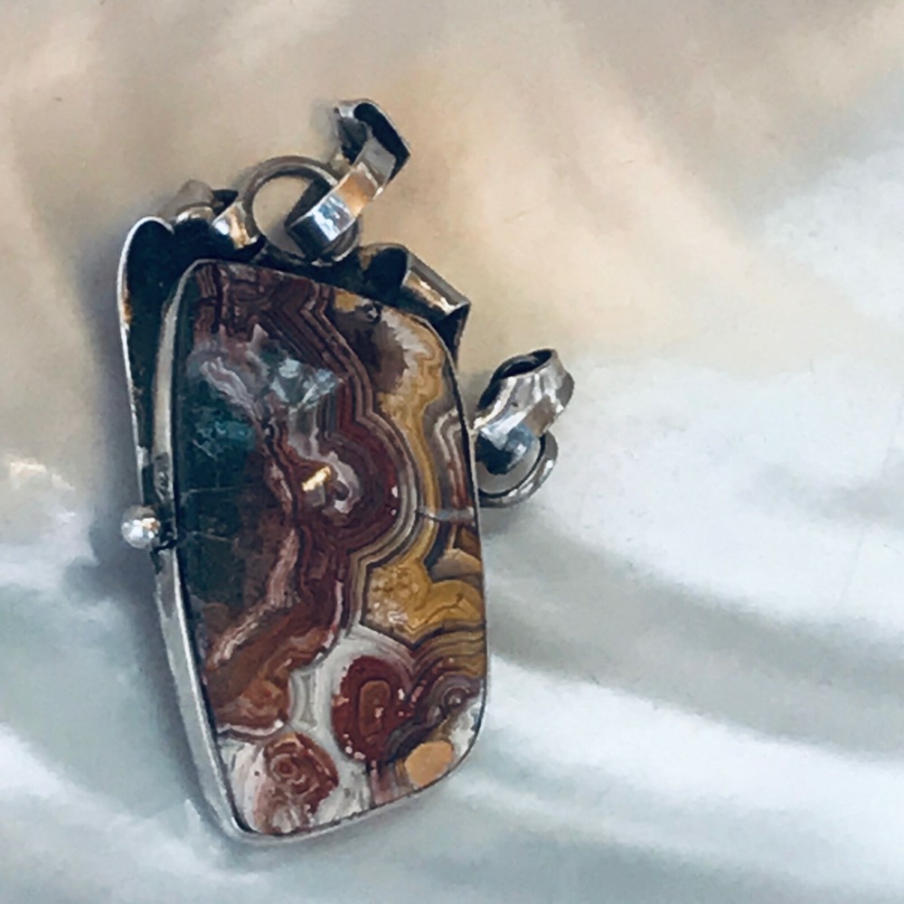Estate E. Herrara Signed Reddish Brown Black & White Agate Stone in Curled Silve