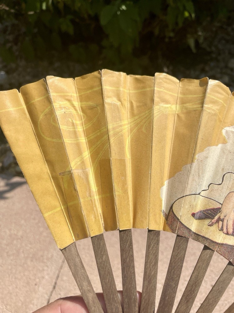 vintage advertising hand fan