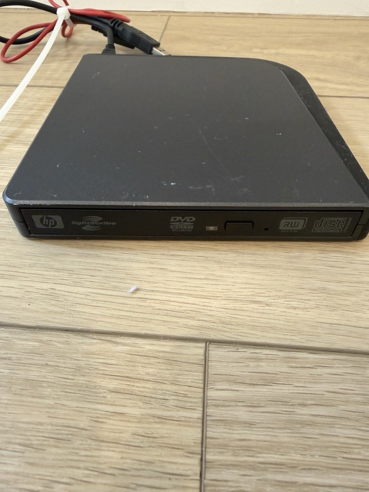 HP dvd 556S LightScribe External Slim Multi Format DVD Writer. EUC.