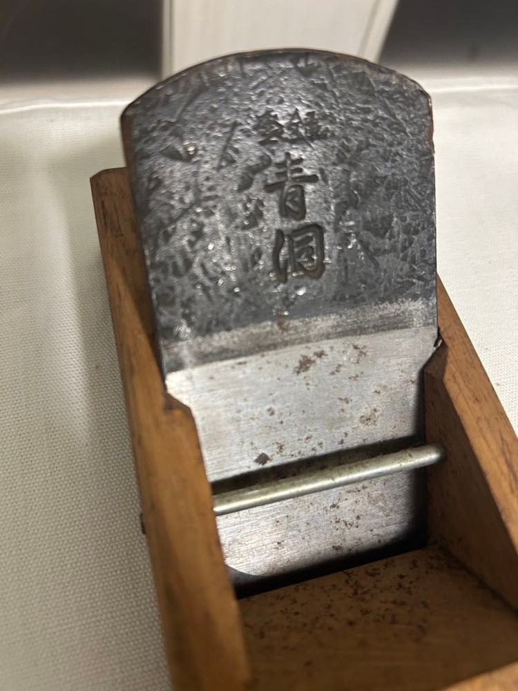 There are small stains and scratches.