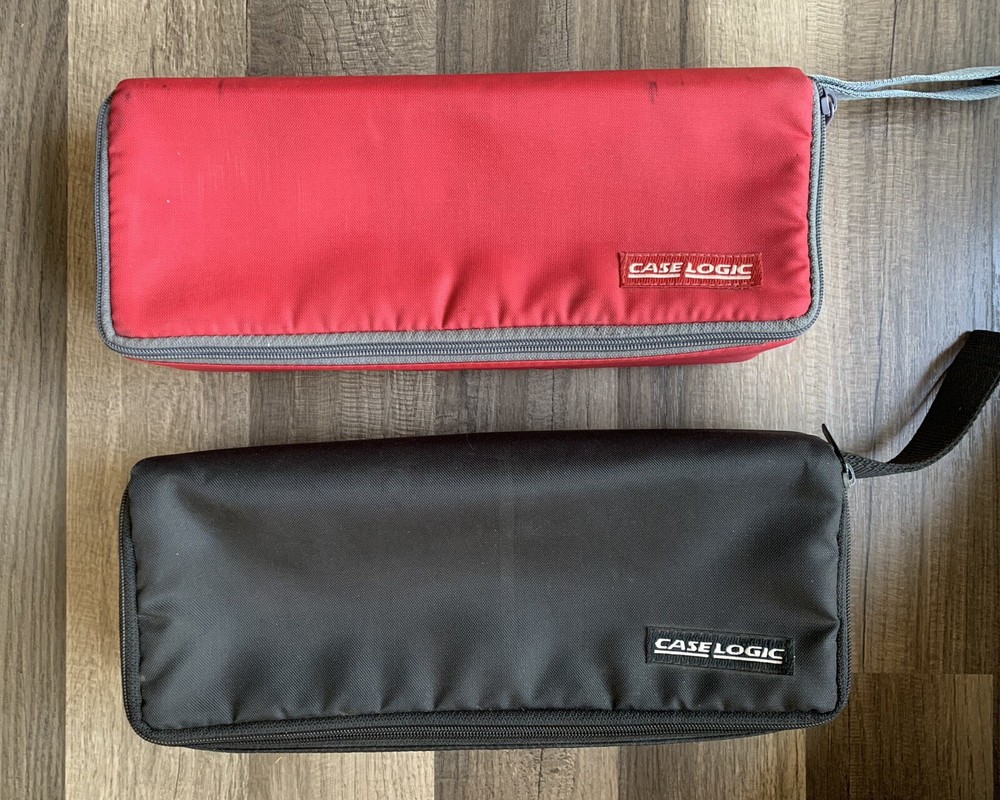 2- Case Logic 15-Cassette Cases (one Red, One Black)