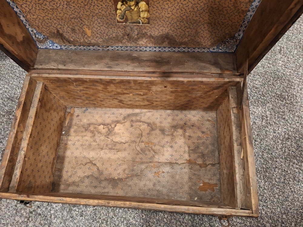 Antique steamer trunk round top