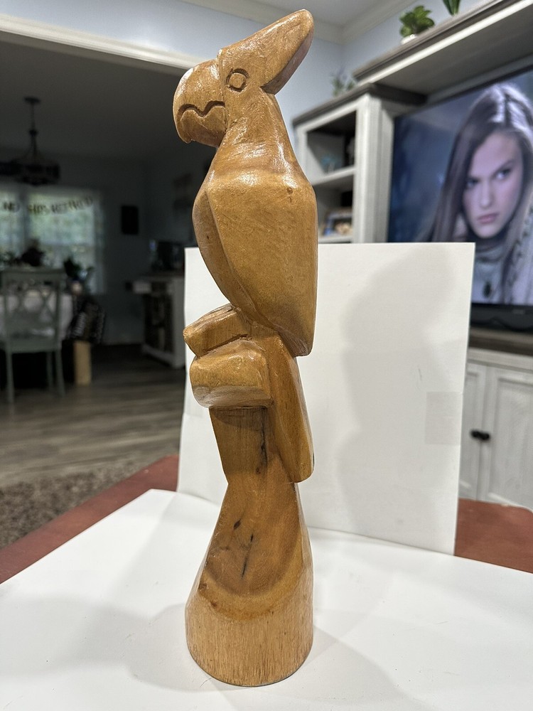 carved wooden parrot
