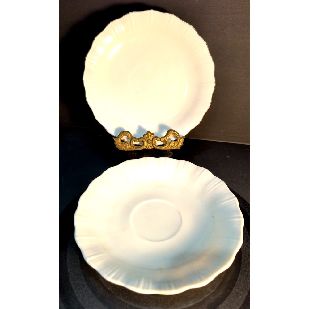 Two white Porcelain Saucers UV reactive