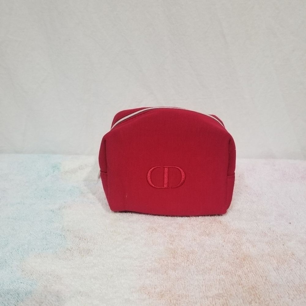 Christian Dior cosmetic bag red . New without tags.