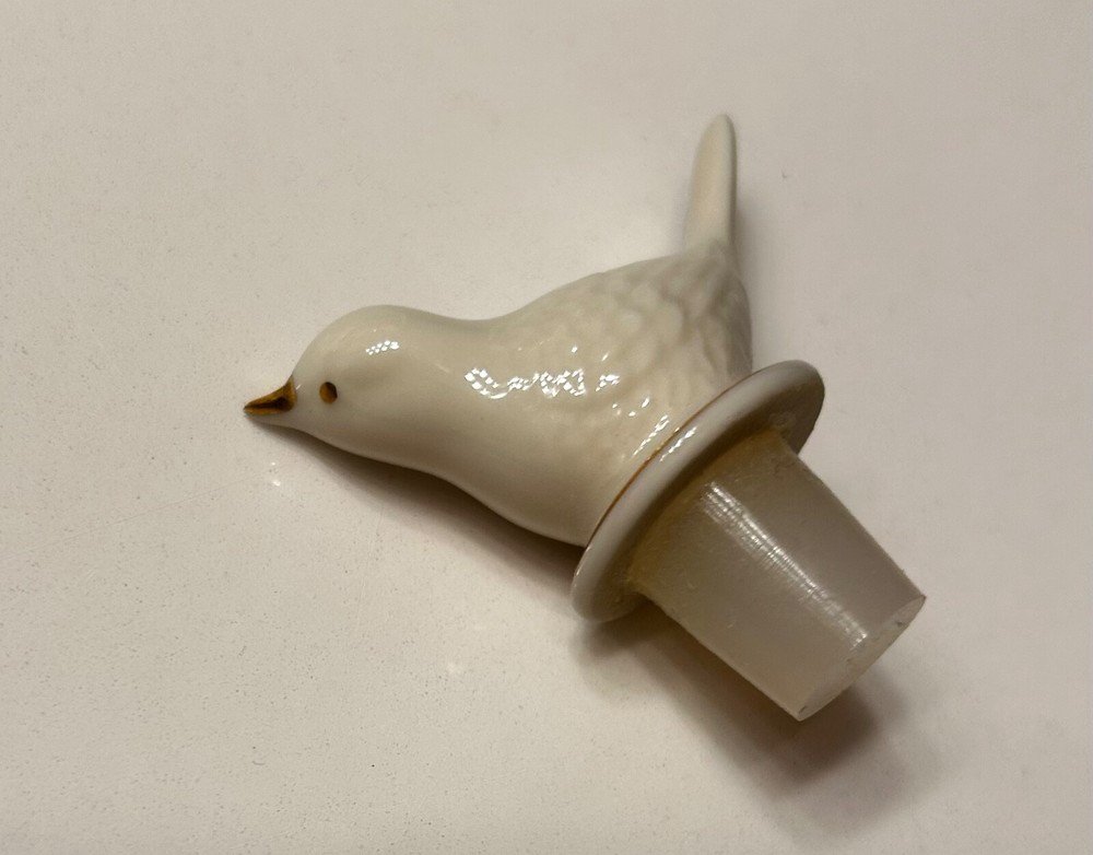 three lenox perfume stoppers