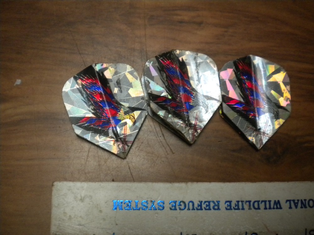 Three Unknown Plastic Dart bodies with silver plastic tails, see pictures,