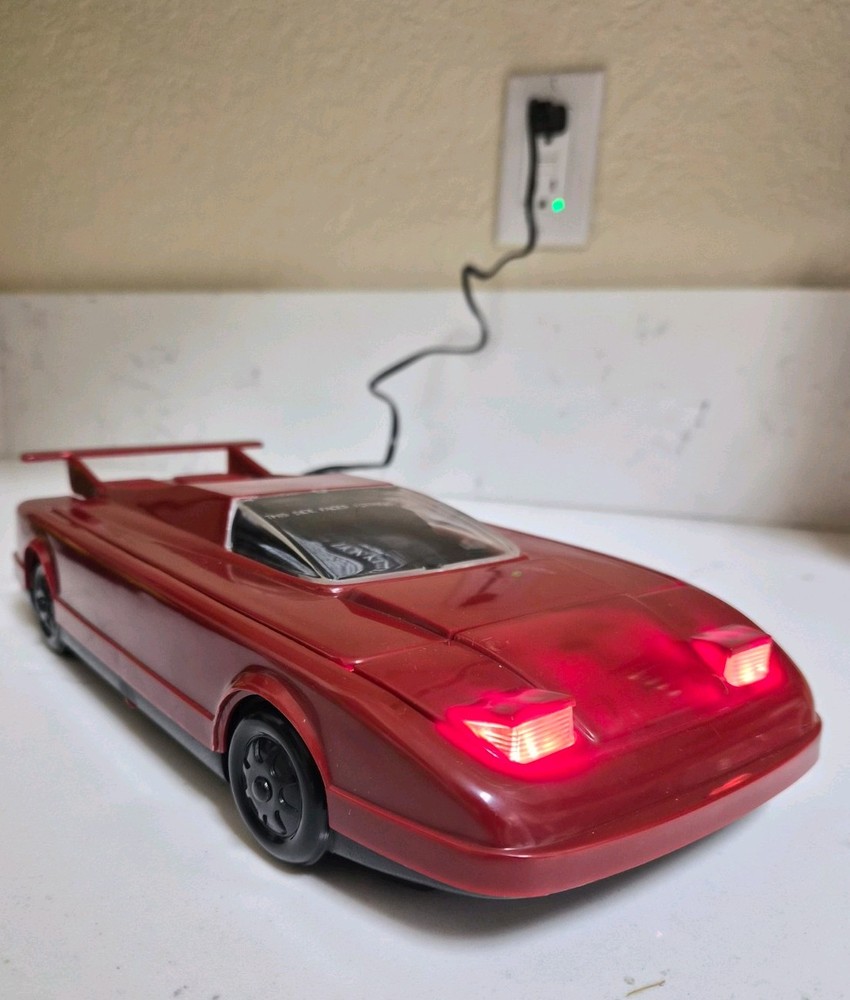 Vintage Red Car Cassette Rewinder. Electronics with Working Lights