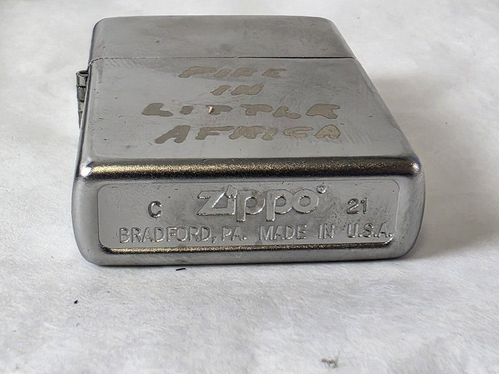 Fire In Little Africa Zippo Lighter Unfired