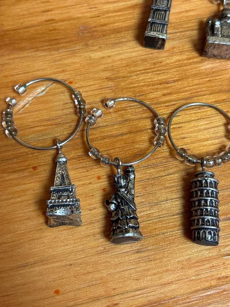 Wine charms and bottle openers